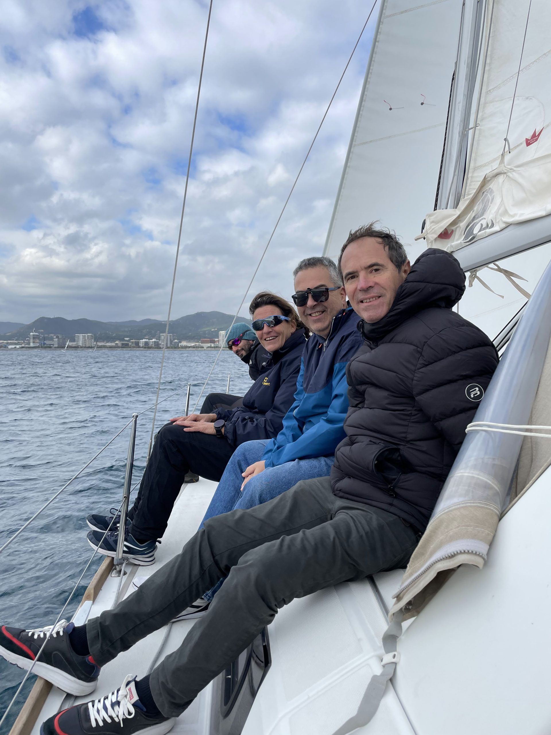 Photo people at the american cup in barcelona on a boat rented with costabella